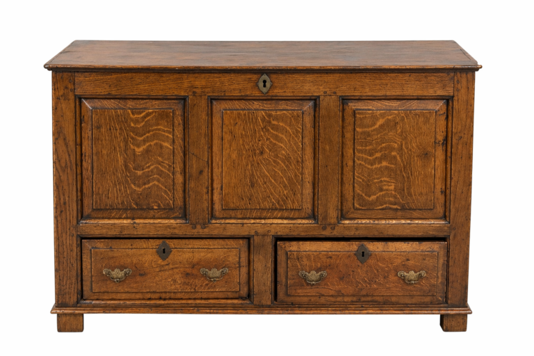 Antique wooden cabinet with three panel doors and two drawers, featuring ornate handles and a rich brown finish.